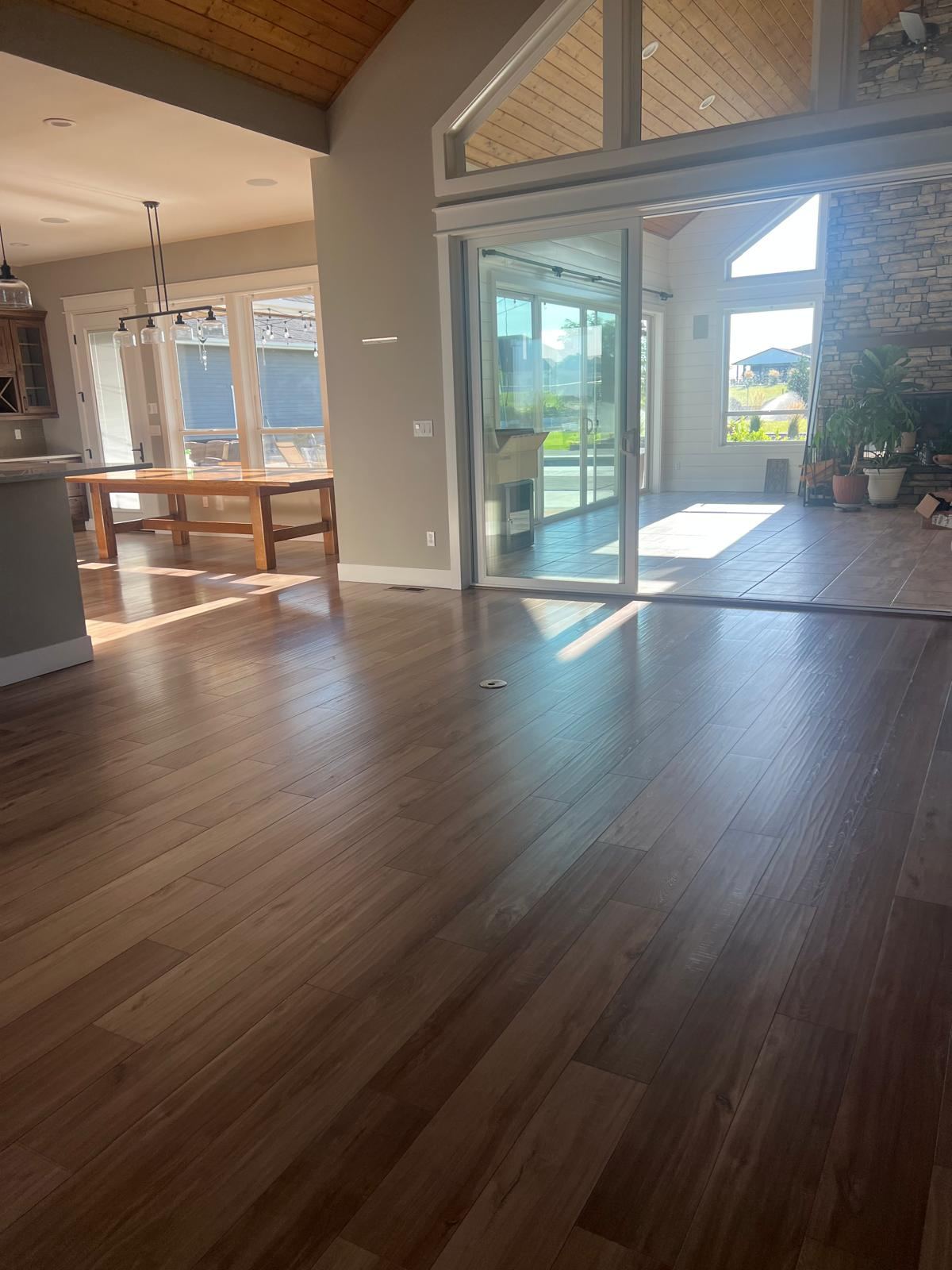 Bright open home with clean wood-look floors