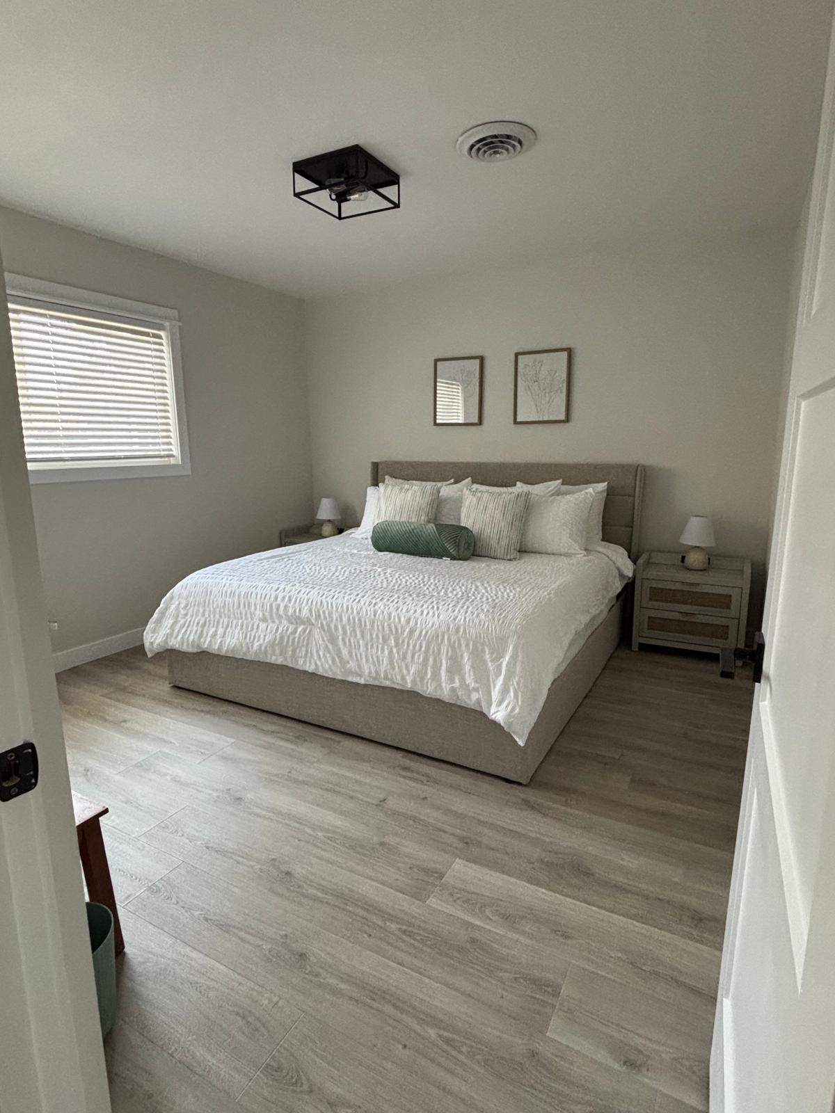 Guest-ready bedroom with fresh white bedding